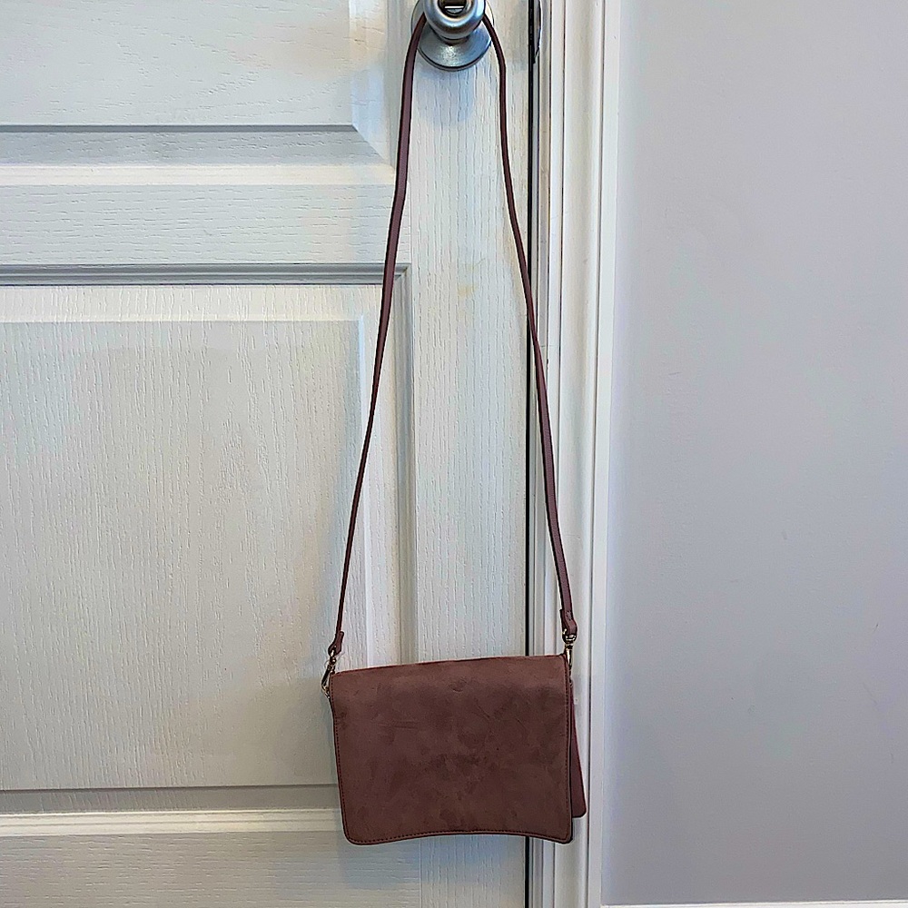 Brand new bag. Can be used as a satchel or clutch